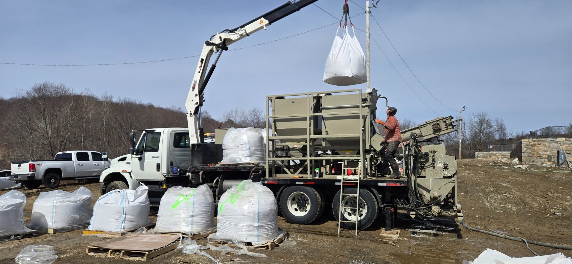 Crane truck with bag on equipment